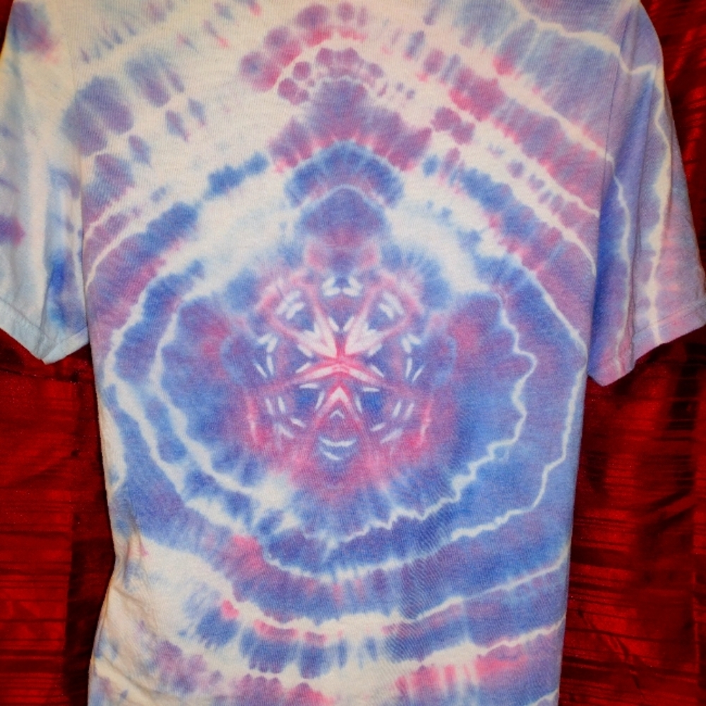 Handmade tiedye size small. Mandala with colors that glow under uv light.
